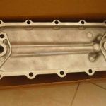NISSAN PE6 Oil Cooler Cover